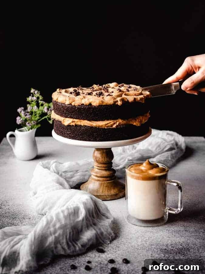 slicing into a dalgona coffee chocolate cake