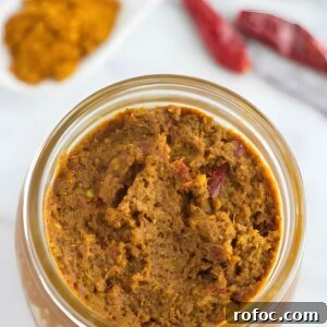 Thai yellow curry paste in a jar.