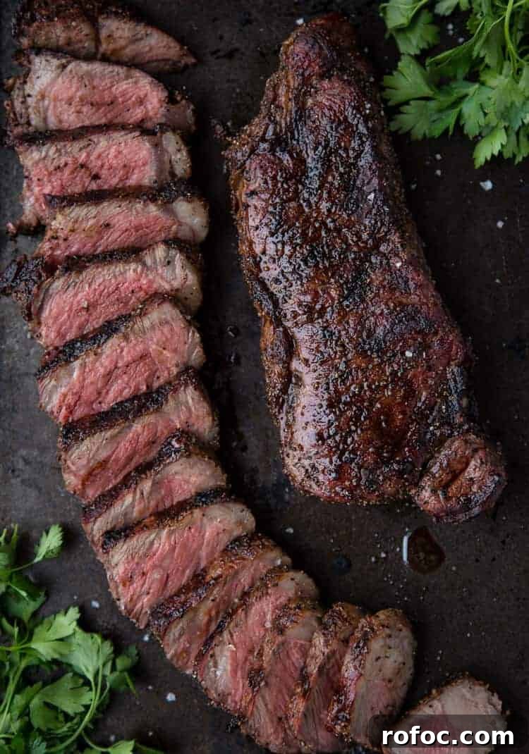 A perfect grilled steak, cooked to perfection and sliced 